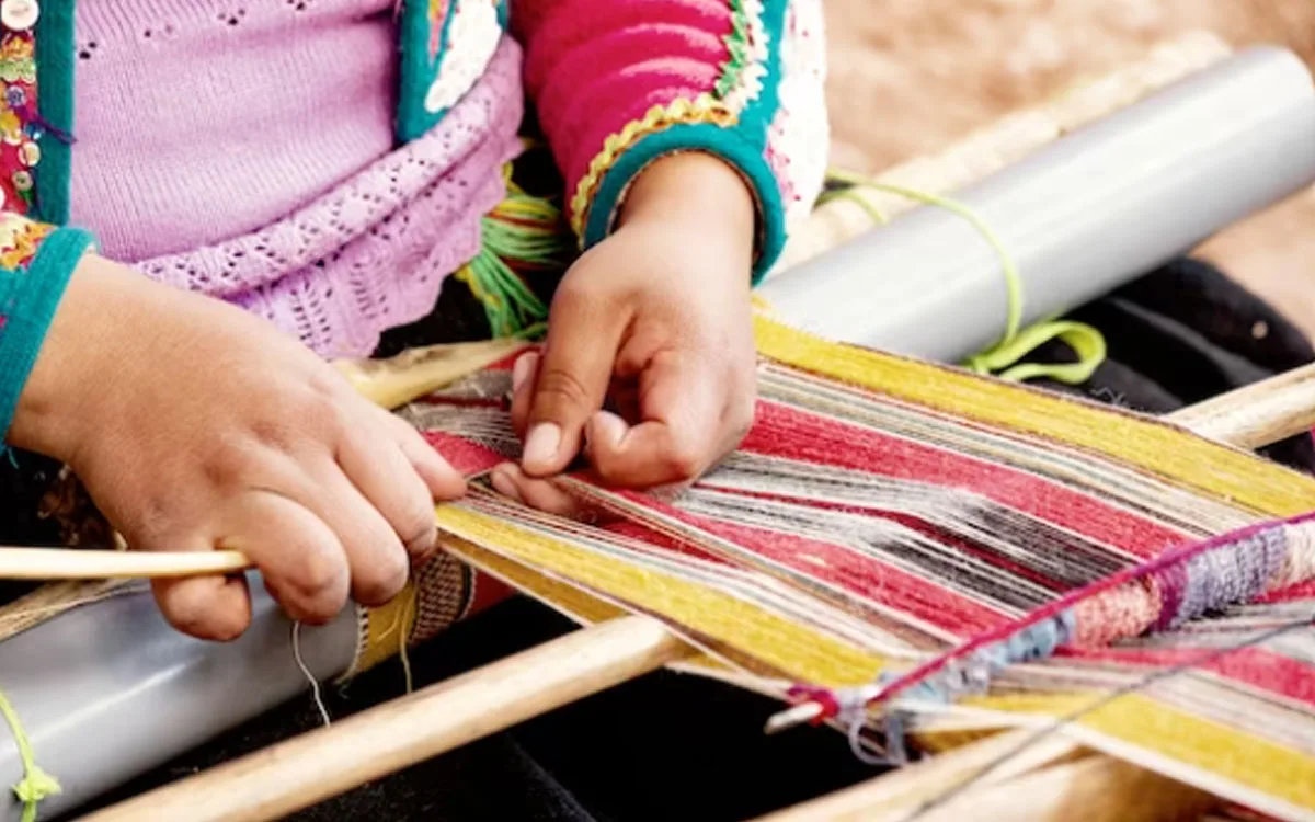 A weaver at a handloom in Varanasi